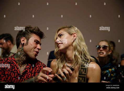 Italian singer Fedez is flanked by his wife Italian fashion  